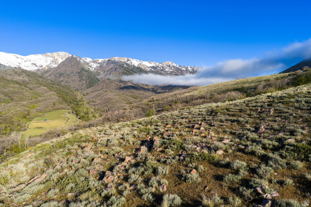 6975 North Durfee Way, Unit 20 Eden, UT 84310 - Photo 8 of 15 Expansive mountain landscape featuring varied terrain, a clear blue sky, and distant snow-capped peaks