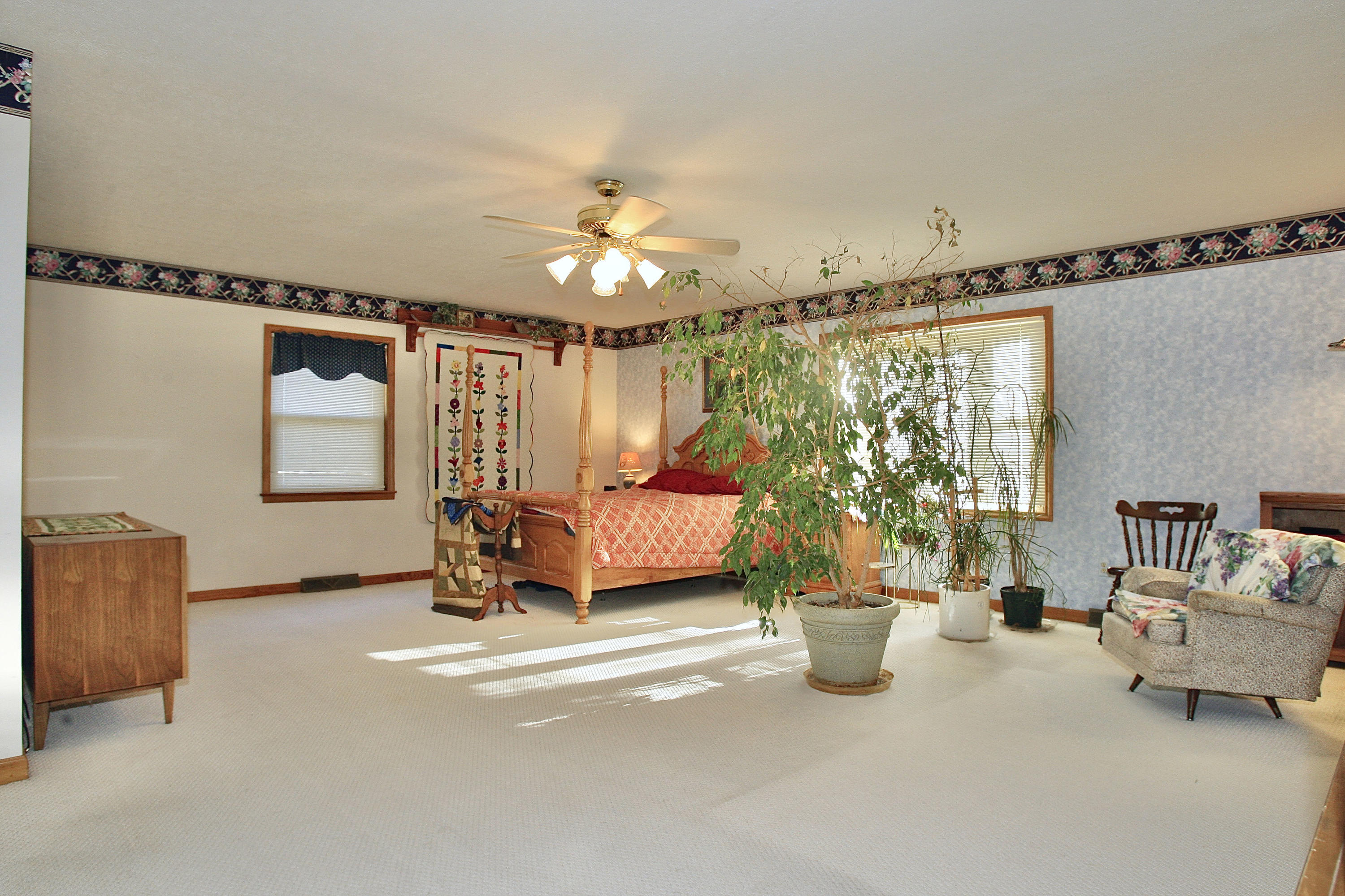 1160 Scuffling Hill Road Rocky Mount, VA 24151 - Photo 22 of 50 a bedroom with furniture window and a ceiling fan