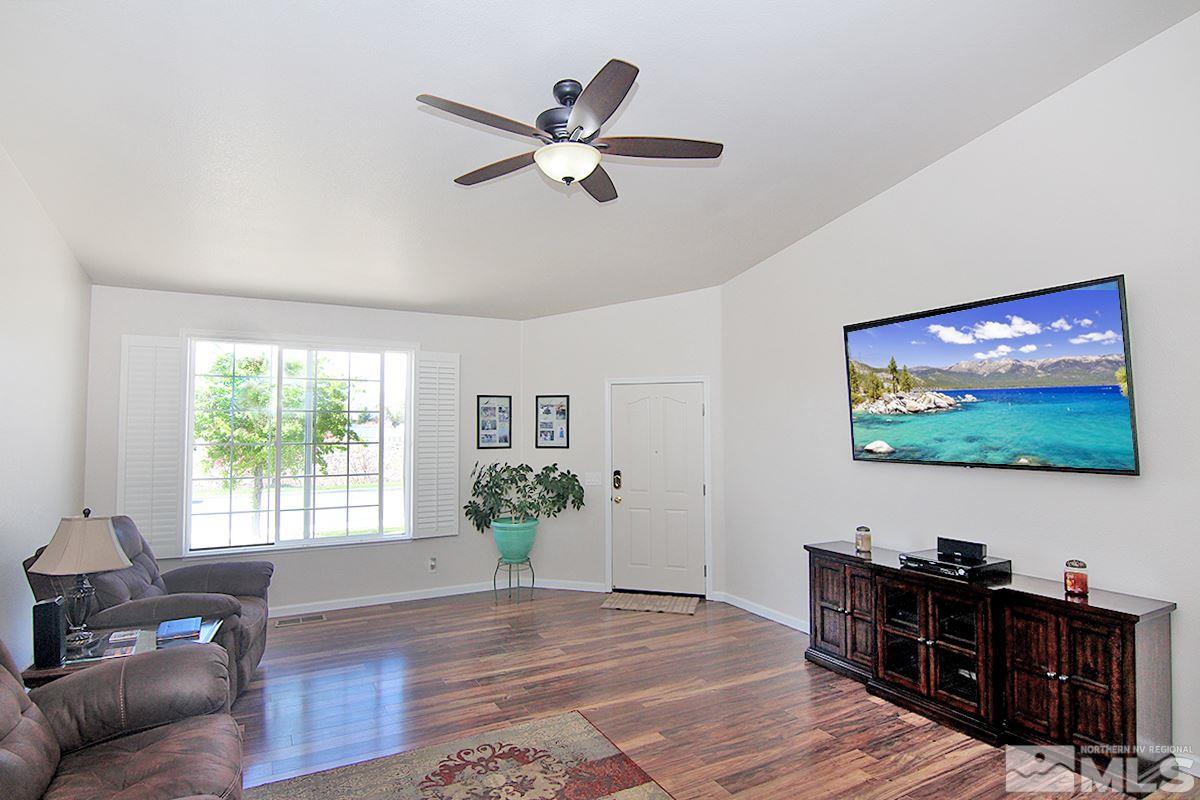 1360 Rainbow Ridge Road Reno, NV 89523 - Photo 4 of 22 a view of a livingroom with furniture window and wooden floor