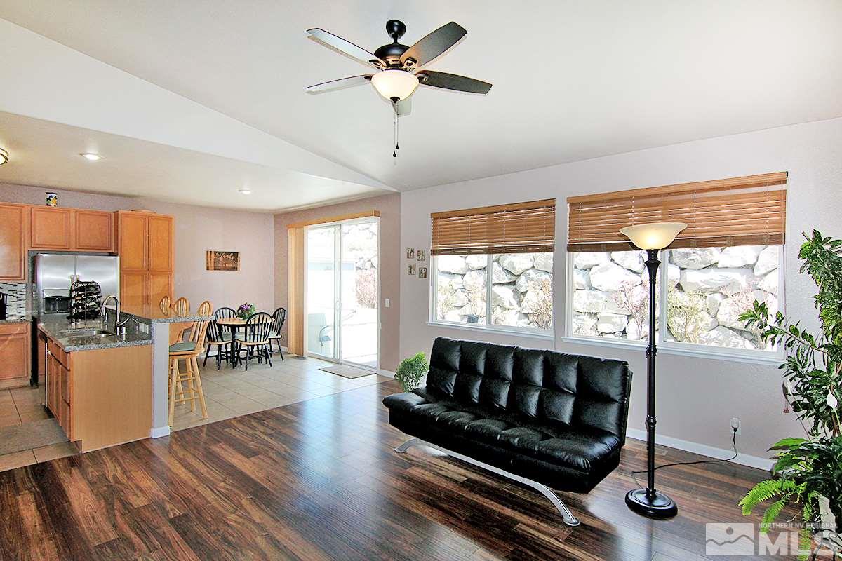 1360 Rainbow Ridge Road Reno, NV 89523 - Photo 8 of 22 a living room with furniture and a large window