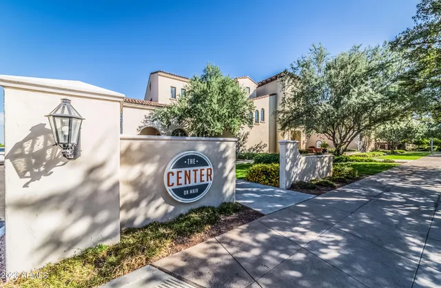 a front view of a building with a street