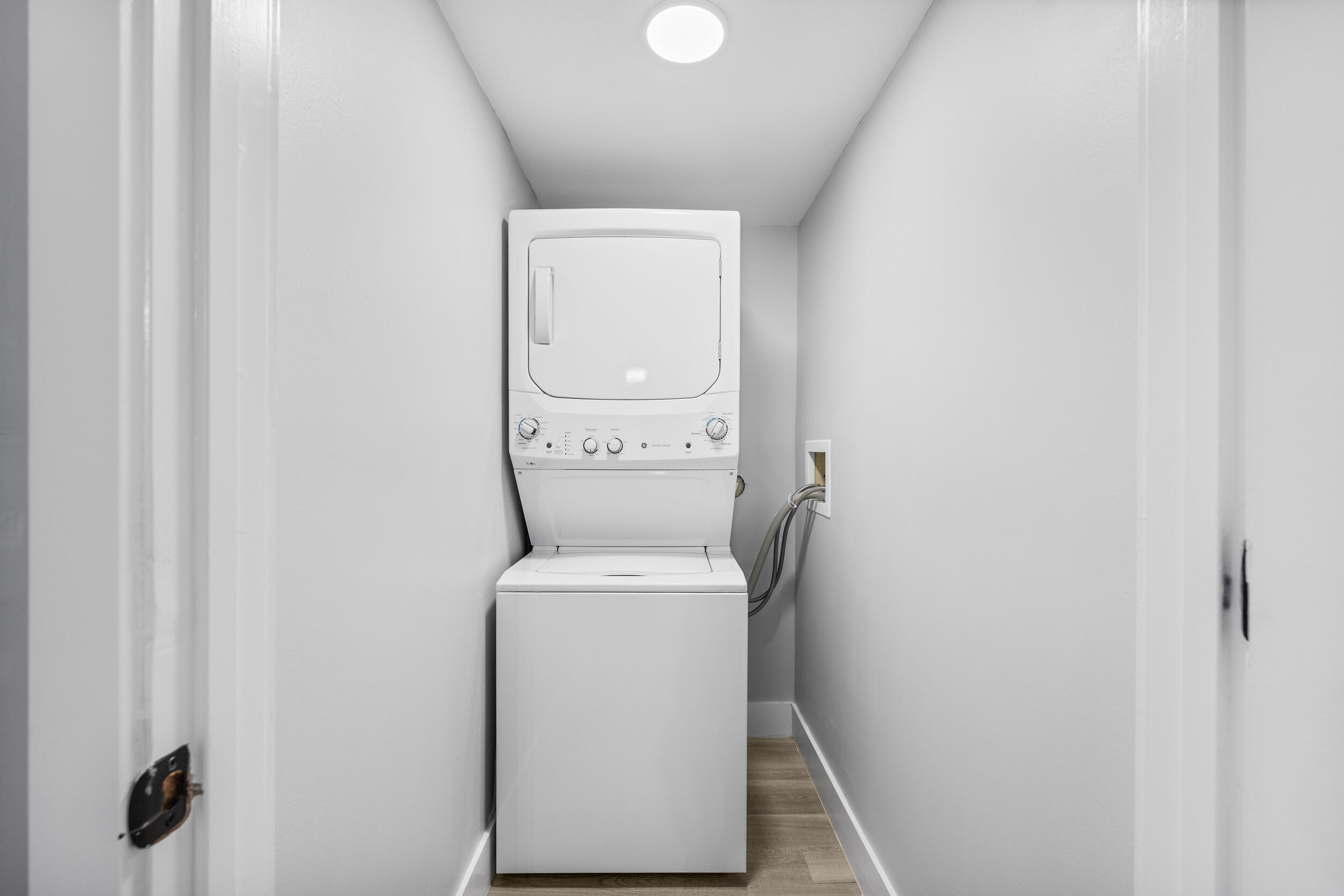 17867 Thelma Avenue, Unit A Jupiter, FL 33458 - Photo 20 of 35 a utility room with dryer and washer