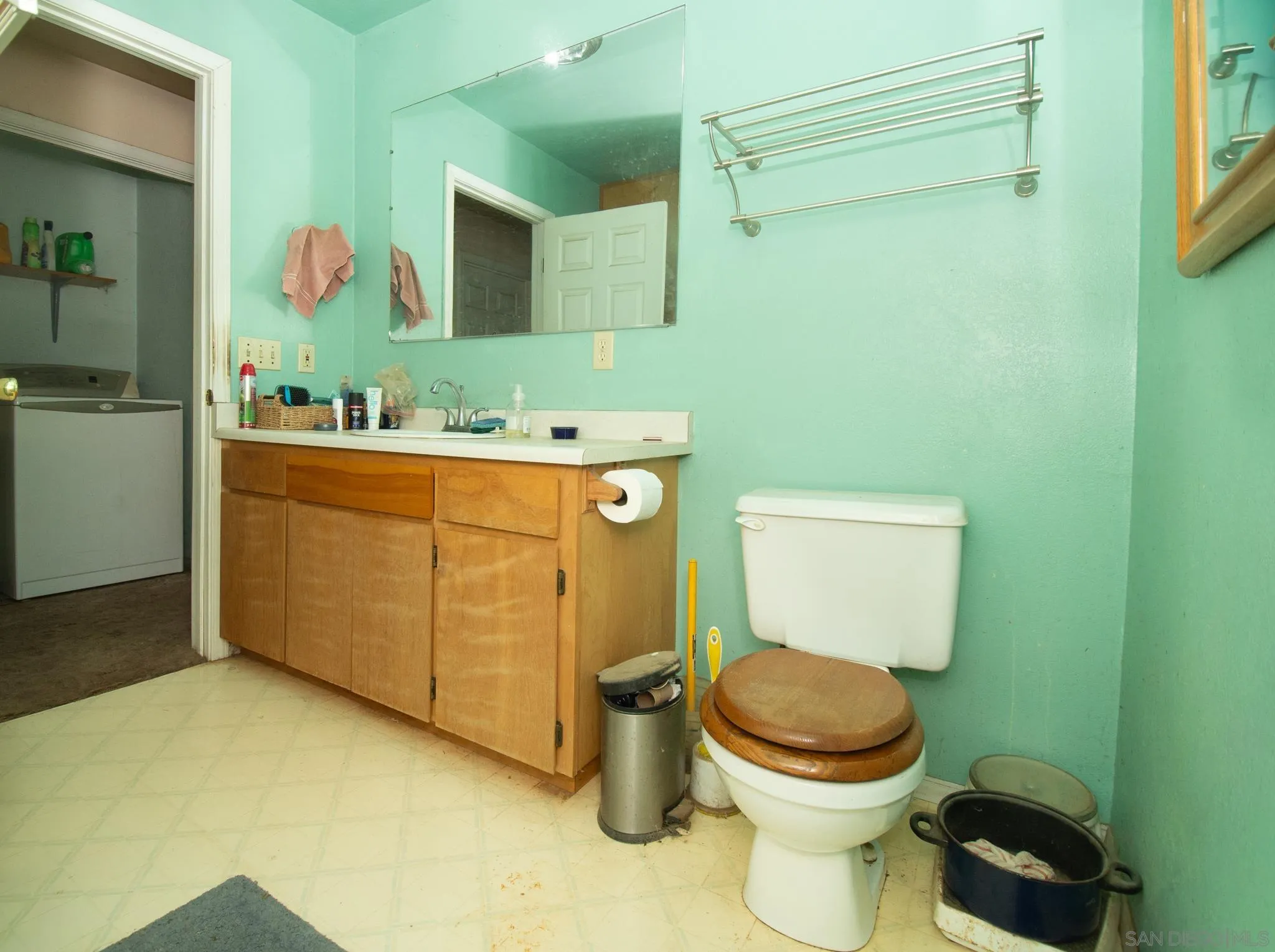 9897 Dyerville Loop Road Myers Flat, CA 95554 - Photo 12 of 24 a bathroom with a toilet sink vanity and mirror