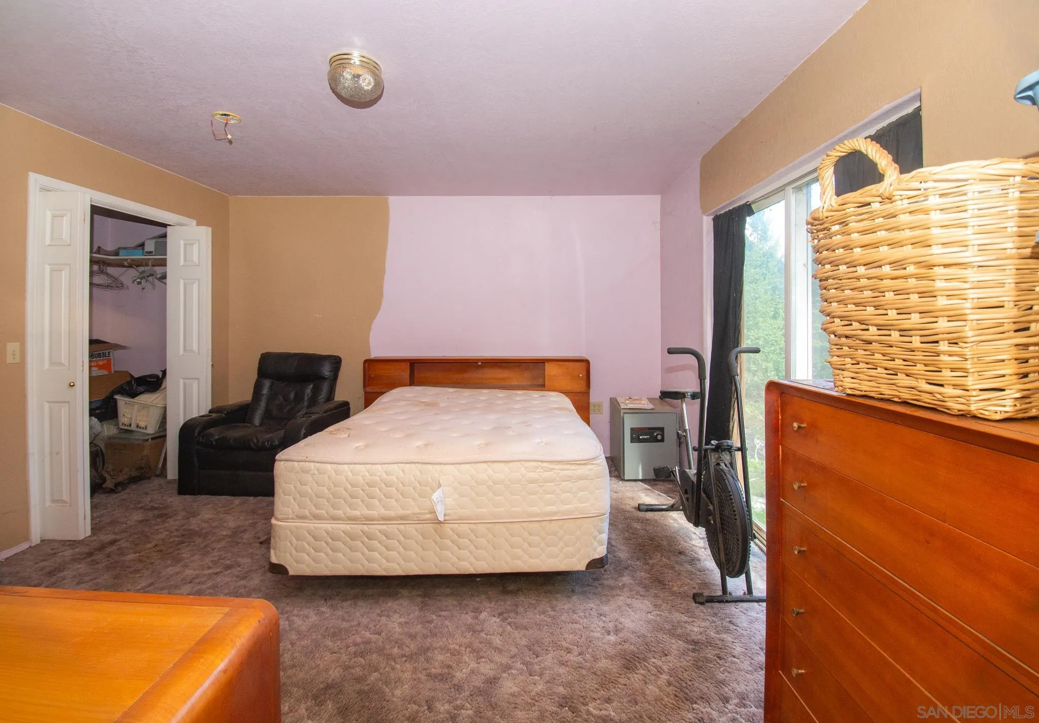 9897 Dyerville Loop Road Myers Flat, CA 95554 - Photo 13 of 24 a bedroom with a bed and window