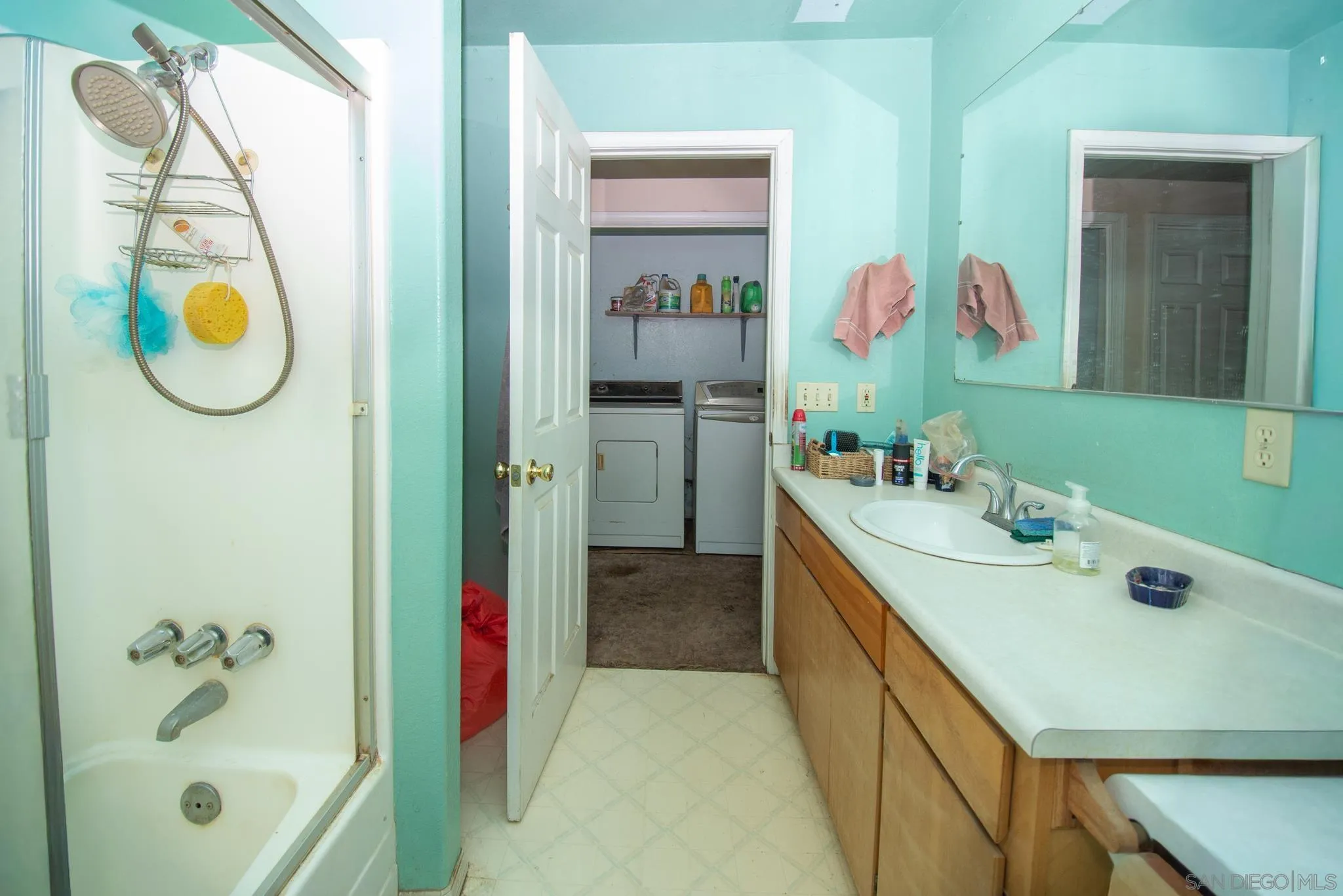 9897 Dyerville Loop Road Myers Flat, CA 95554 - Photo 10 of 24 a bathroom with a tub sink and mirror