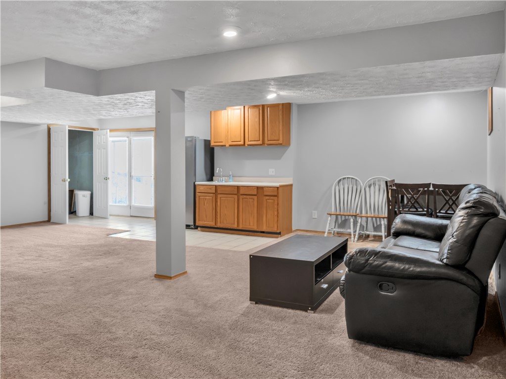 25 Callaway Springboro, OH 45066 - Photo 37 of 51 This versatile basement offers ample space and includes a convenient wet bar area.