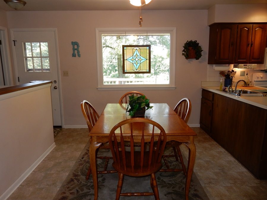 6759 Alvina Road Rockford, IL 61101 - Photo 8 of 13 a view of a dining room with furniture and window