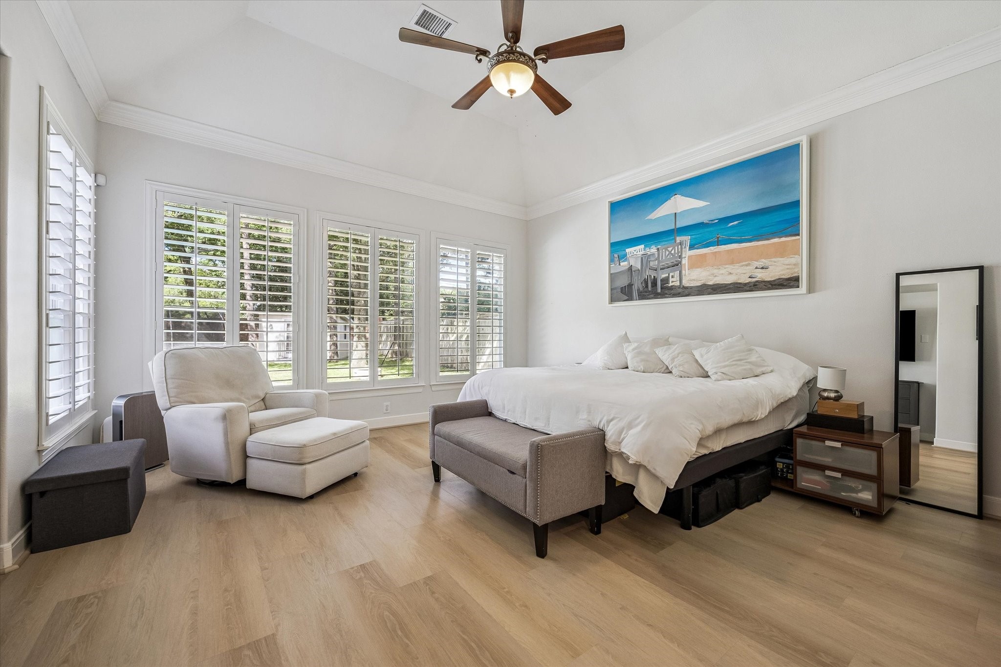 3047 Bonnebridge Way Boulevard Houston, TX 77082 - Photo 36 of 50 Spacious primary bedroom retreat featuring light-colored walls, elegant coffered ceilings, abundant natural light, and stunning views of the pool and backyard.