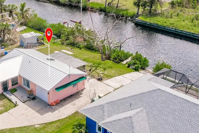 an aerial view of a house having yard