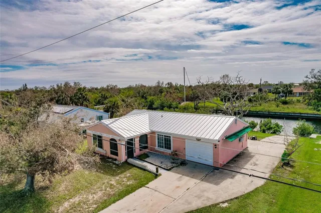 a view of a house with a ocean view