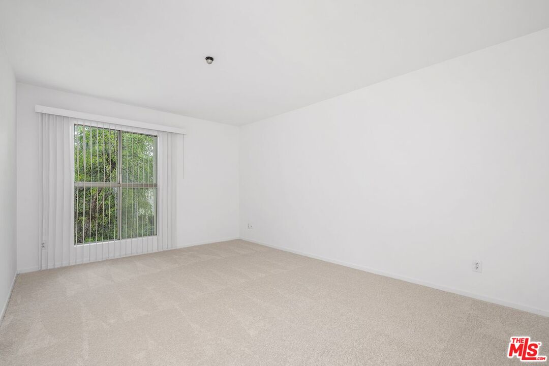 1211 Raintree Circle Culver City, CA 90230 - Photo 17 of 44 a view of an empty room with a window