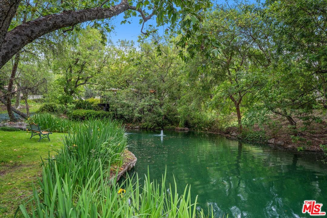 1211 Raintree Circle Culver City, CA 90230 - Photo 29 of 44 a view of a lake with a yard