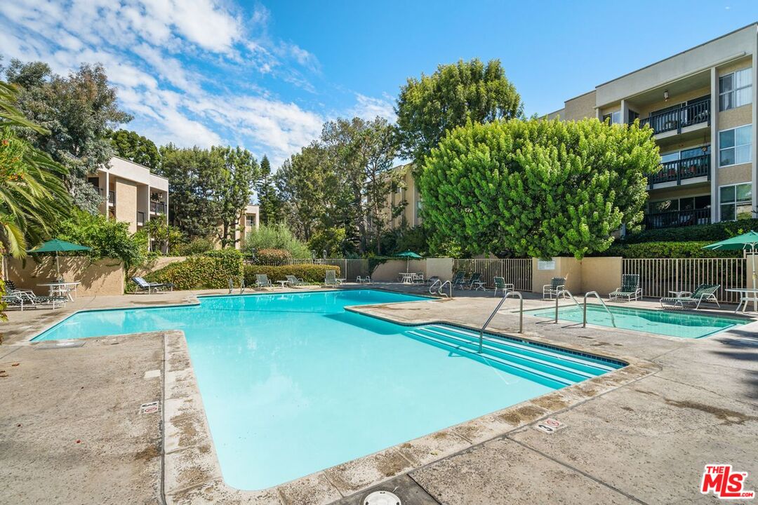 1211 Raintree Circle Culver City, CA 90230 - Photo 37 of 44 a park view with a bench and trees