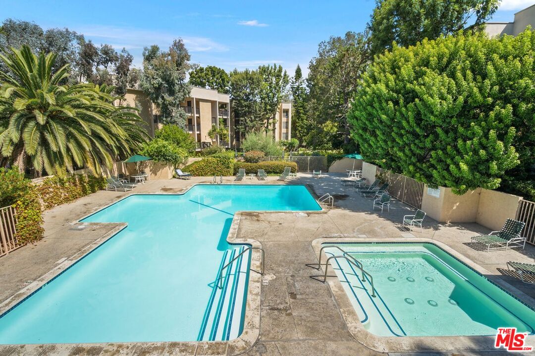 1211 Raintree Circle Culver City, CA 90230 - Photo 38 of 44 swimming pool view with a seating space and a garden view