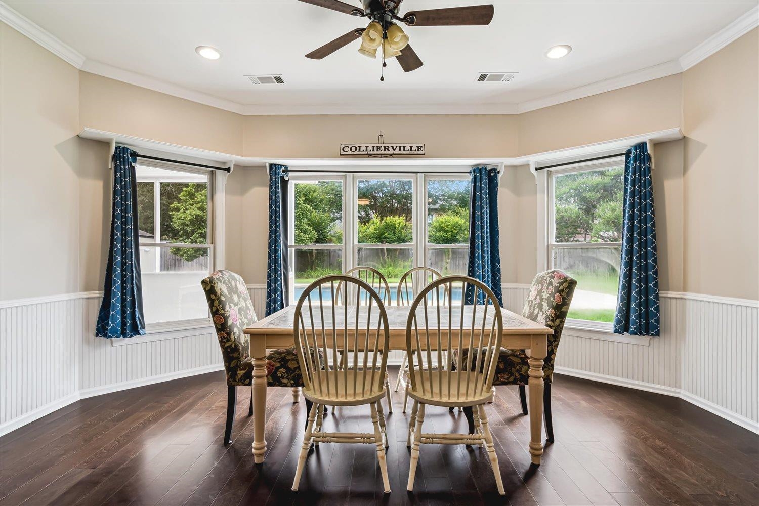 1489 John Ridge Drive Collierville, TN 38017 - Photo 14 of 39 a view of a dining room with furniture window and wooden floor