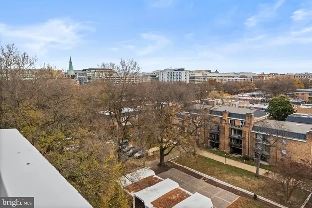 a view of city with ocean
