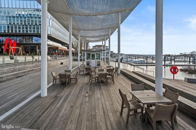 a view of a building with sitting area