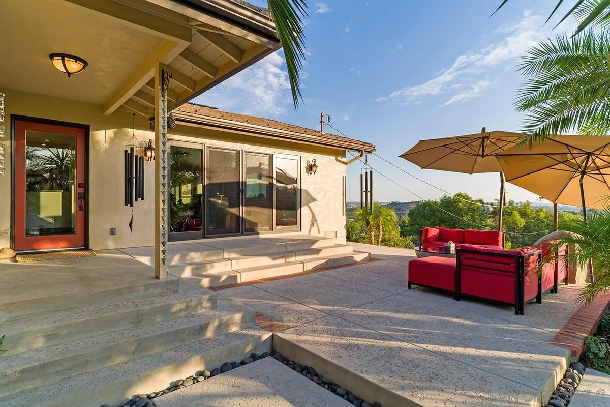 14316 High Valley Road Poway, CA 92064 - Photo 1 of 32 a view of a chairs and table in the patio