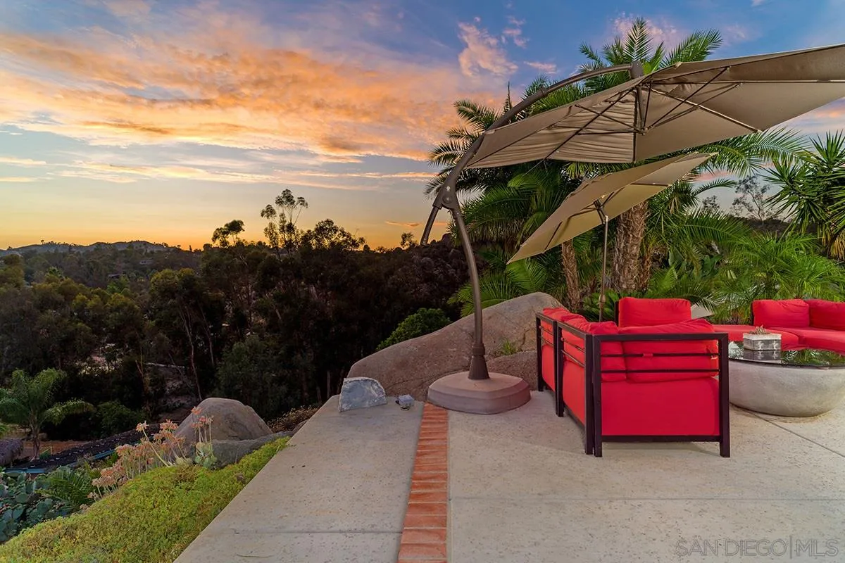 14316 High Valley Road Poway, CA 92064 - Photo 21 of 32 a view of a couches in patio and a yard