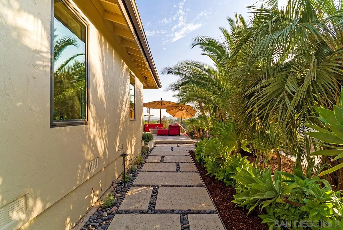 14316 High Valley Road Poway, CA 92064 - Photo 24 of 32 a view of a pathway of a house with a yard