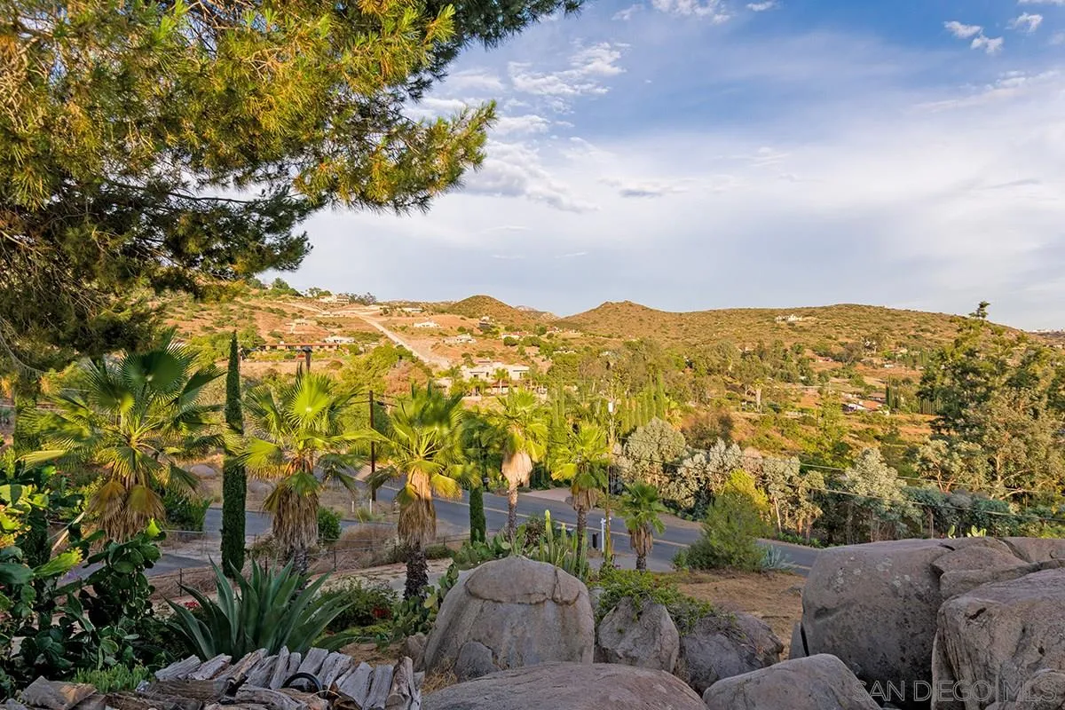 14316 High Valley Road Poway, CA 92064 - Photo 27 of 32 a view of a city with lush green forest