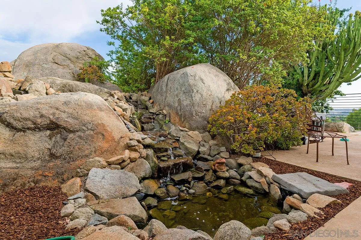 14316 High Valley Road Poway, CA 92064 - Photo 30 of 32 a view of a backyard of the house