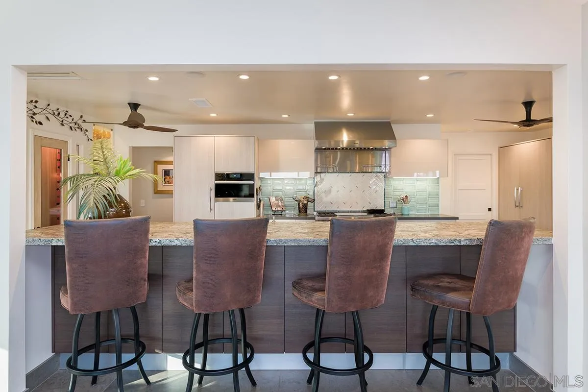 14316 High Valley Road Poway, CA 92064 - Photo 3 of 32 a view of kitchen with dining area