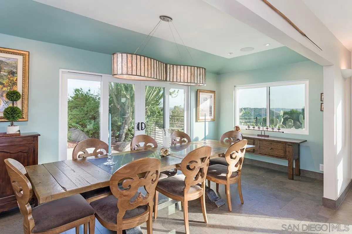 14316 High Valley Road Poway, CA 92064 - Photo 8 of 32 a view of a dining room with furniture window and outside view