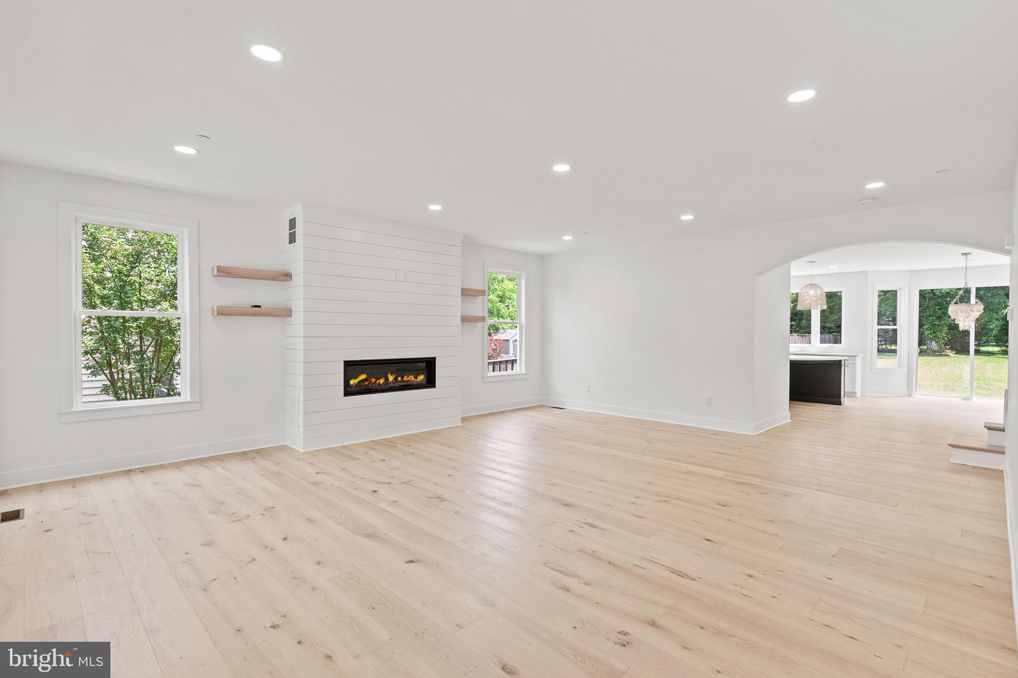 13364 Rousby Hall Road Lusby, MD 20657 - Photo 10 of 50 Living room with engineered hardwood flooring