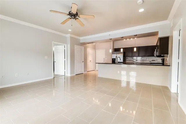 a view of a kitchen with a sink and a microwave