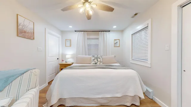 an aerial view of a house with backyard space and patio