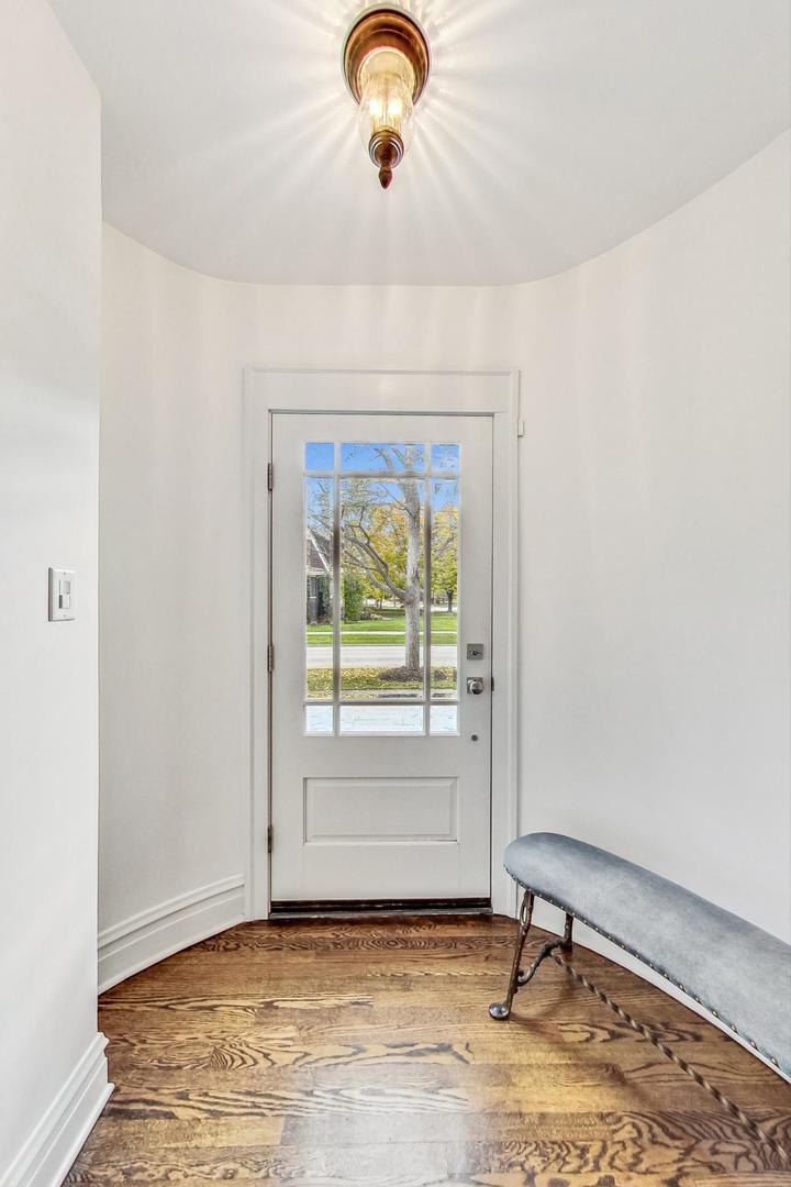 352 Addison Road Riverside, IL 60546 - Photo 5 of 63 a view of entryway with wooden floor