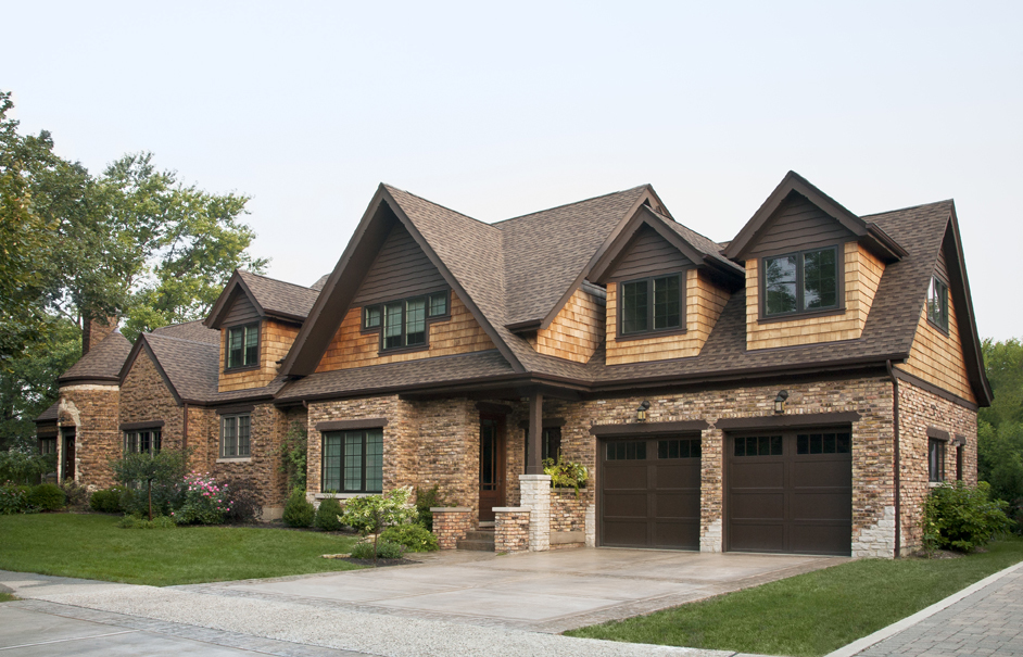 352 Addison Road Riverside, IL 60546 - Photo 58 of 63 a front view of a house with a garden