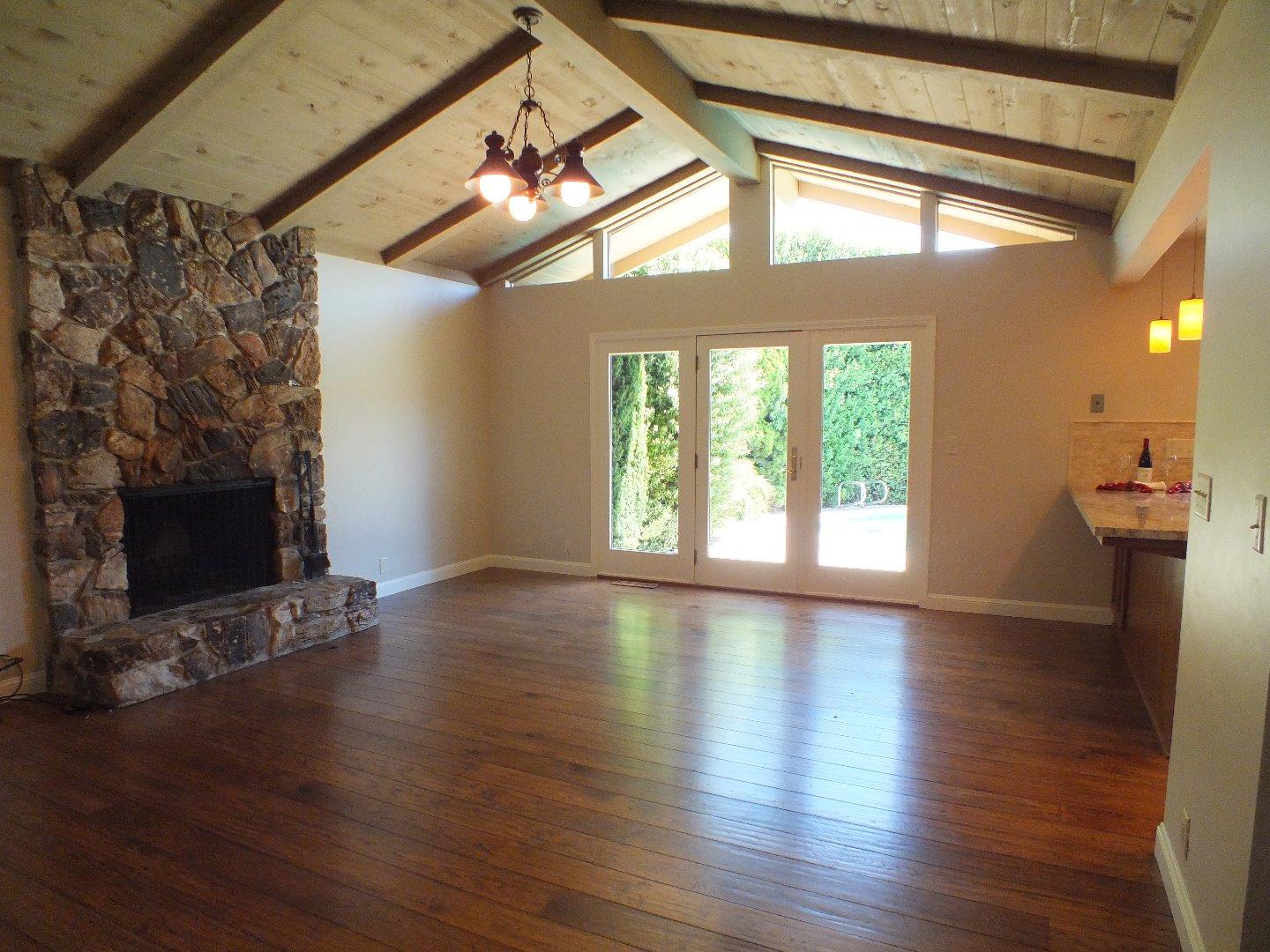 202 Rio Verde Drive Salinas, CA 93901 - Photo 13 of 35 a view of an empty room with wooden floor and a window