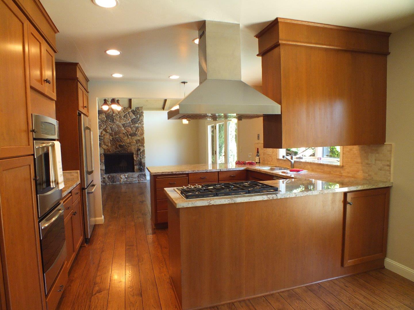 202 Rio Verde Drive Salinas, CA 93901 - Photo 10 of 35 a kitchen with stainless steel appliances granite countertop a sink and a refrigerator