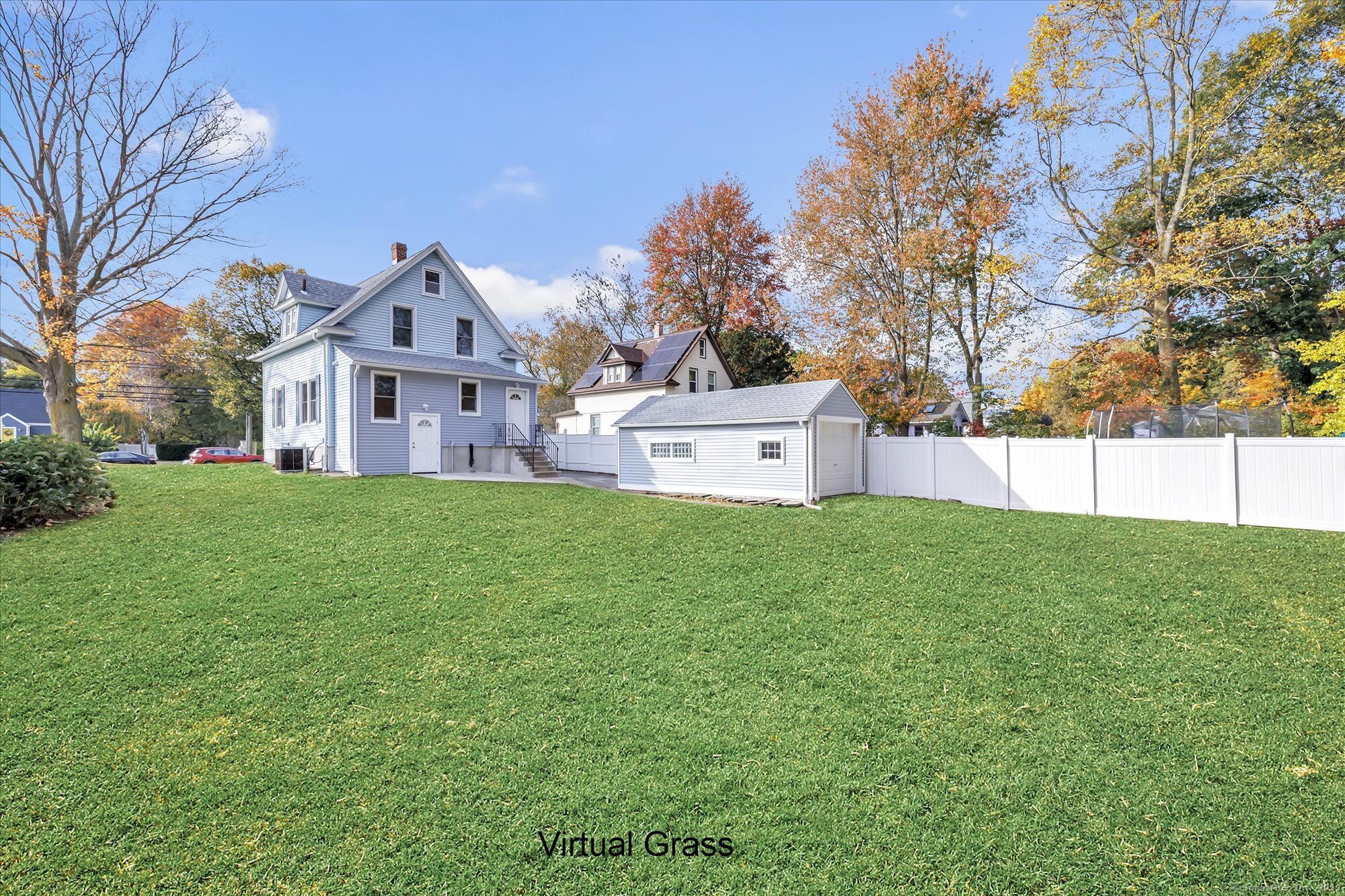 1250 Huntington Road Stratford, CT 06614 - Photo 3 of 39 a front view of a house with a yard and trees