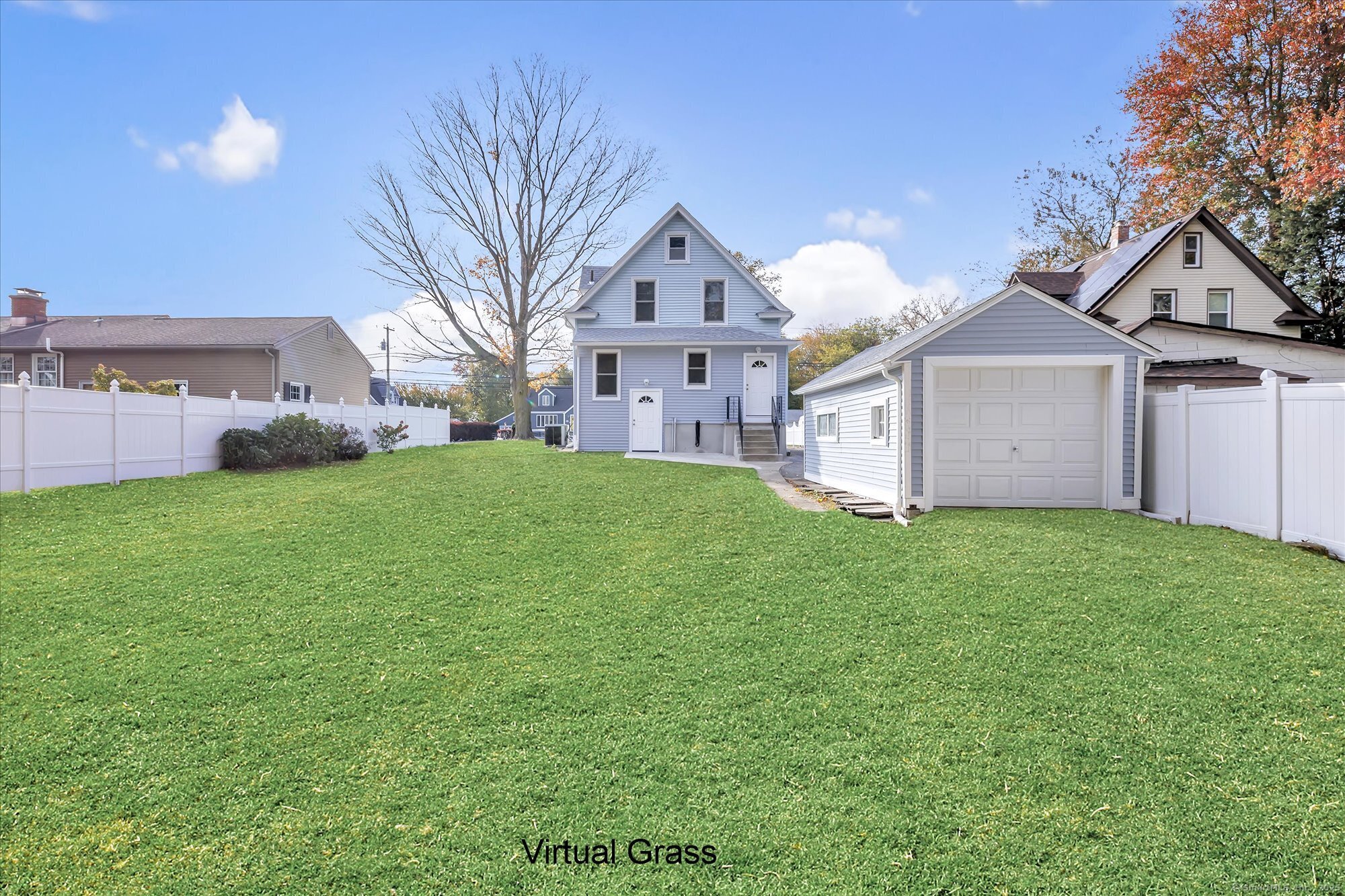 1250 Huntington Road Stratford, CT 06614 - Photo 4 of 39 a view of a big house with a big yard and large trees