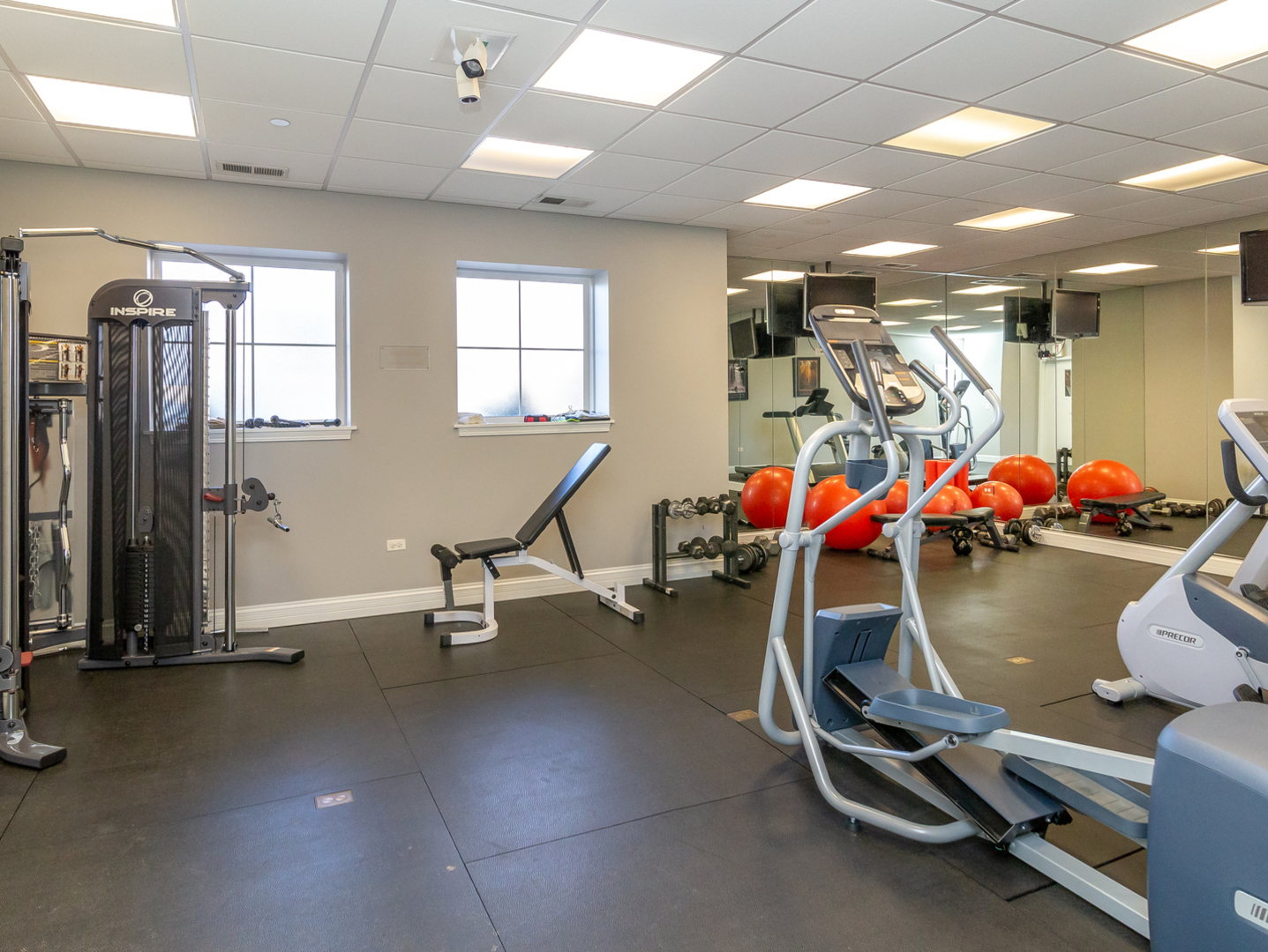 77 North Quentin Road, Unit 402 Palatine, IL 60067 - Photo 15 of 20 a view of a room with gym equipment