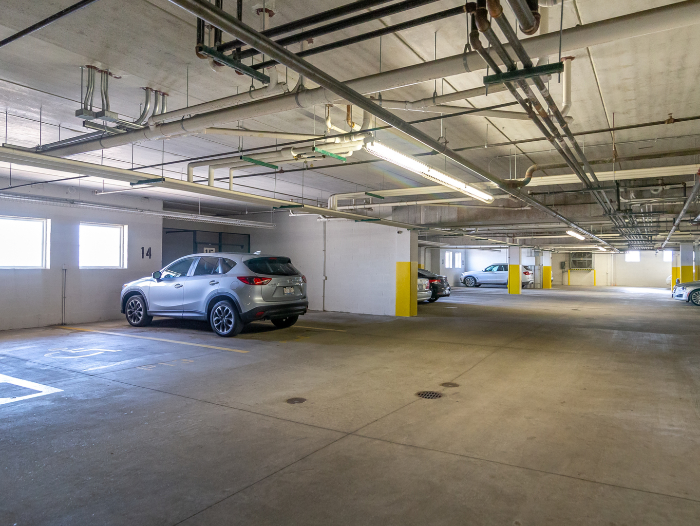 77 North Quentin Road, Unit 402 Palatine, IL 60067 - Photo 16 of 20 a view of a garage
