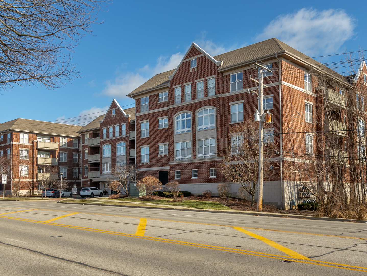 77 North Quentin Road, Unit 402 Palatine, IL 60067 - Photo 17 of 20 a front view of a building