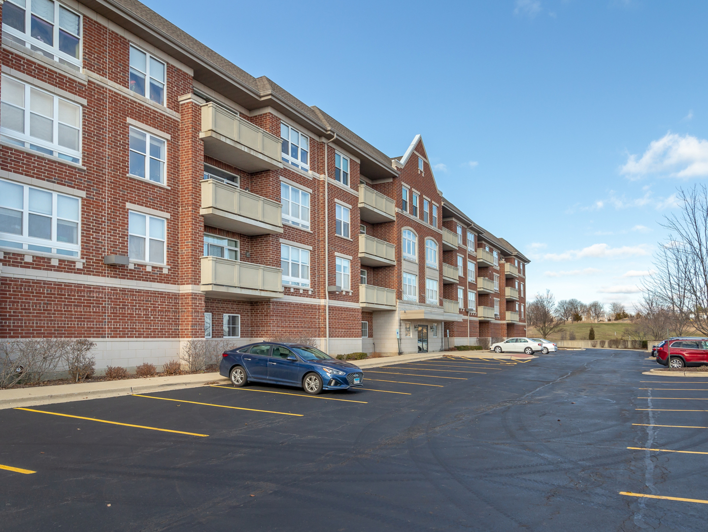 77 North Quentin Road, Unit 402 Palatine, IL 60067 - Photo 18 of 20 a building view