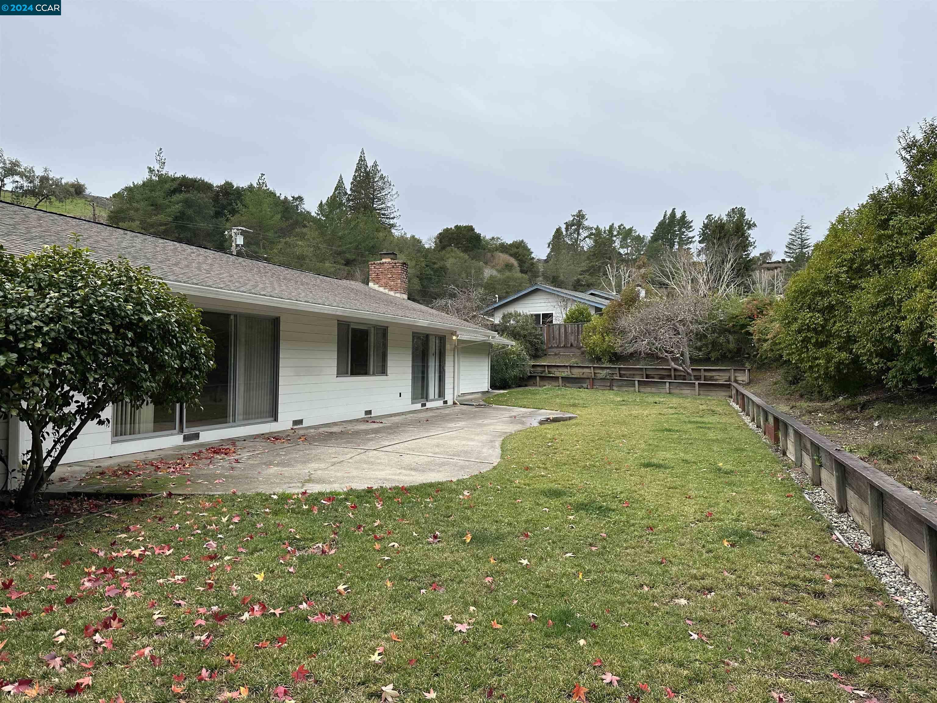 44 Lynwood Place Moraga, CA 94556 - Photo 14 of 14 a view of a house with a yard