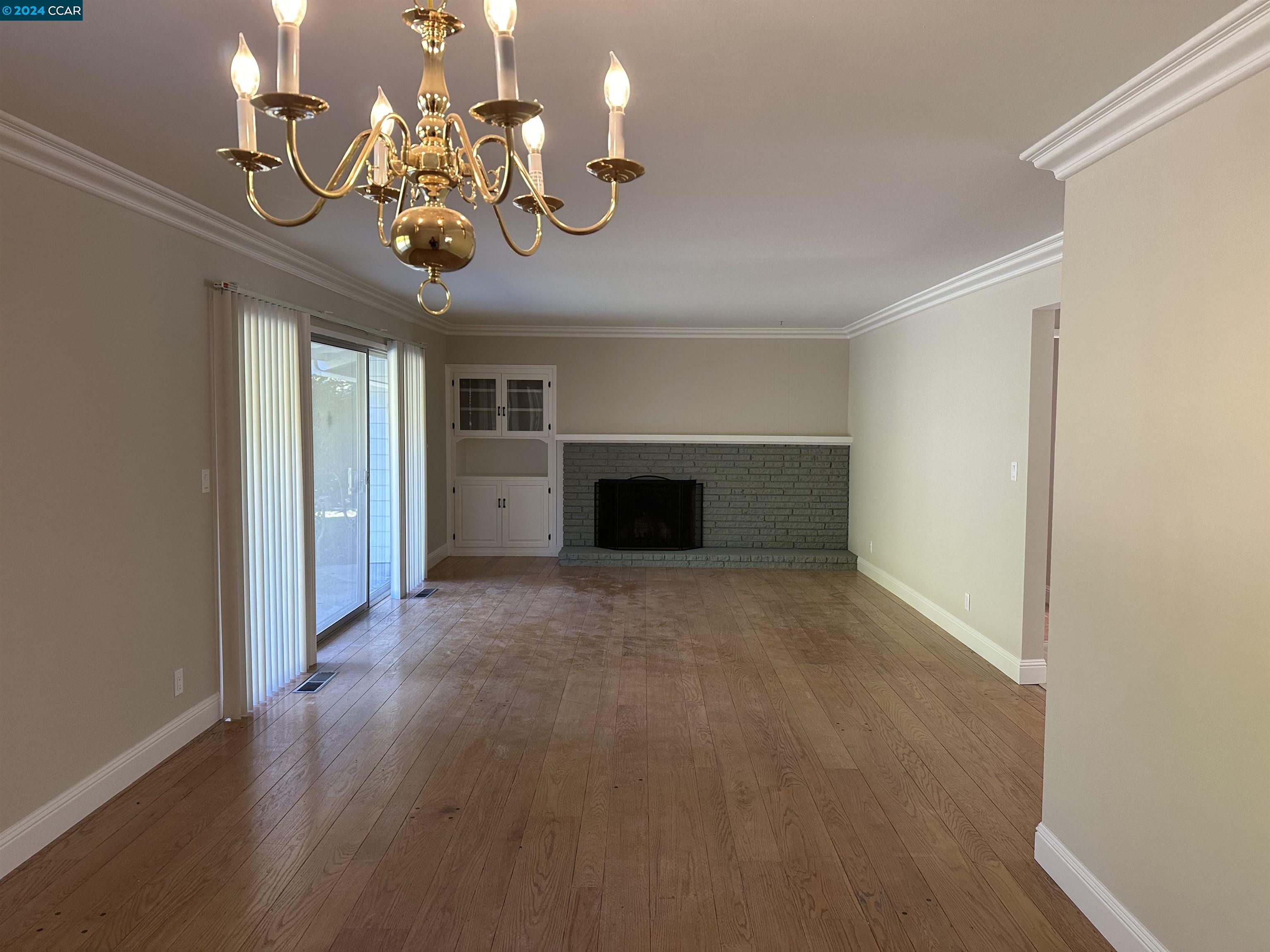 44 Lynwood Place Moraga, CA 94556 - Photo 6 of 14 a view of a livingroom with a chandelier