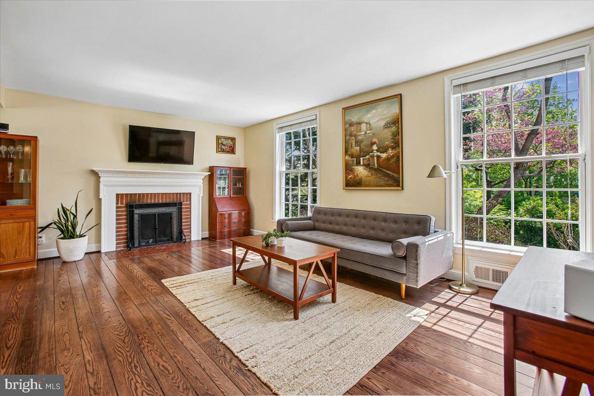 1305 Key Drive Alexandria, VA 22302 - Photo 10 of 64 a living room with furniture a window and a fireplace