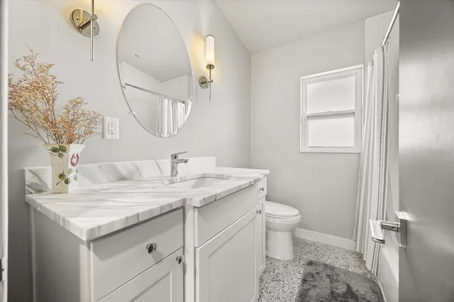 a bathroom with bathtub and shower