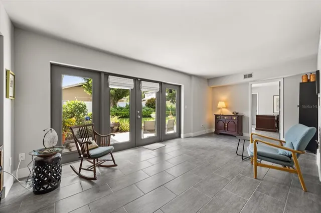 a front view of house with yard and seating area