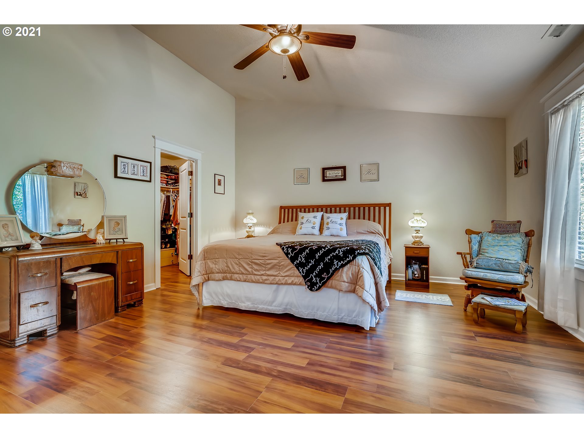 35257 Juniper Drive St. Helens, OR 97051 - Photo 17 of 27 a bedroom with a bed and wooden floor