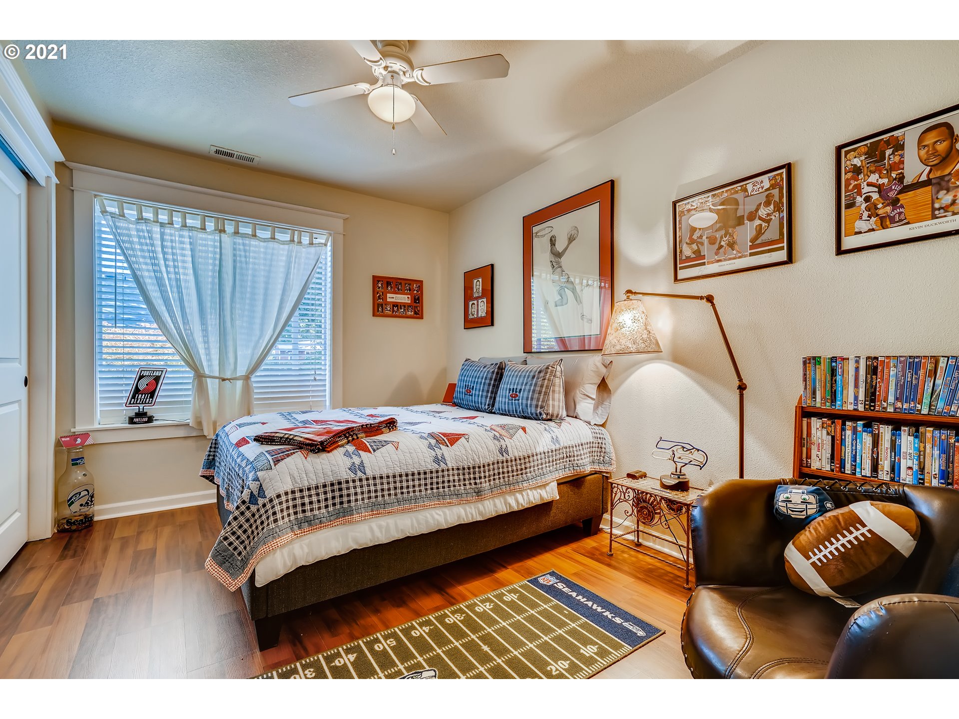 35257 Juniper Drive St. Helens, OR 97051 - Photo 21 of 27 a bedroom with a bed and a book shelf
