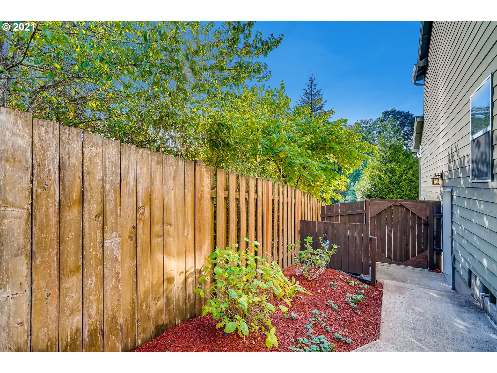 35257 Juniper Drive St. Helens, OR 97051 - Photo 26 of 27 a view of a backyard with wooden fence