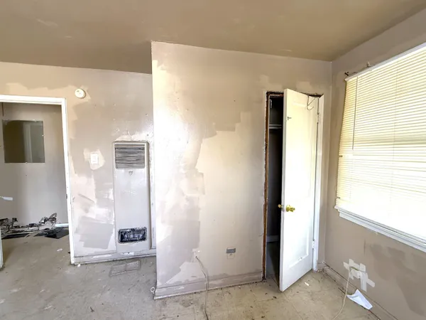 a view of a bathroom with a glass door